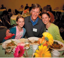 People around table at annual mtg