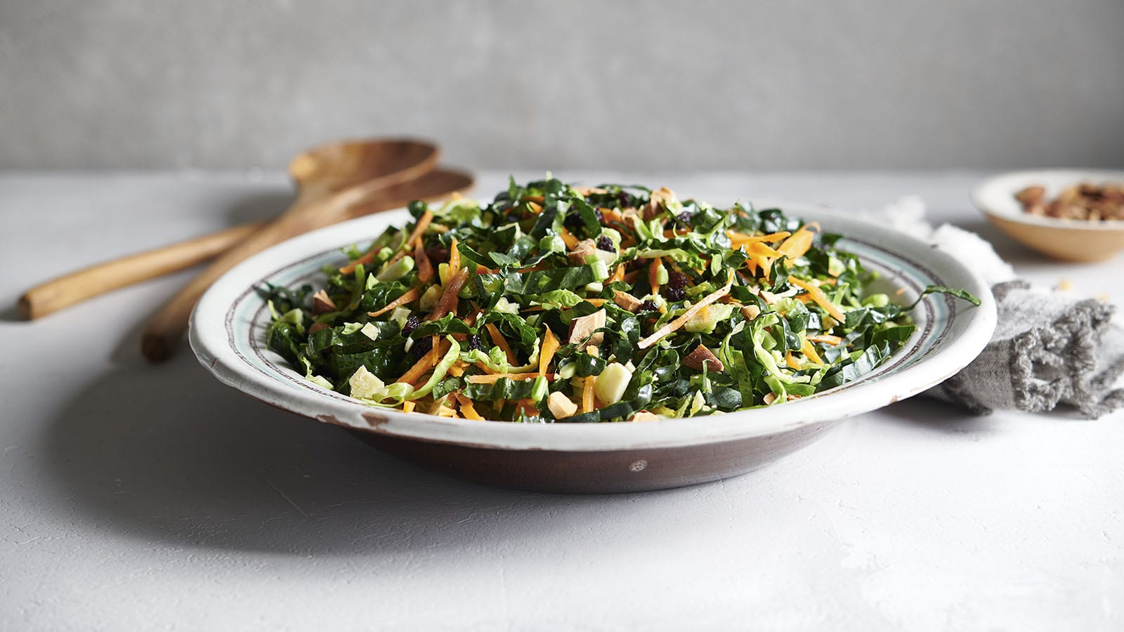 Shredded Kale and Brussels Sprouts Salad with Maple Sesame Dressing