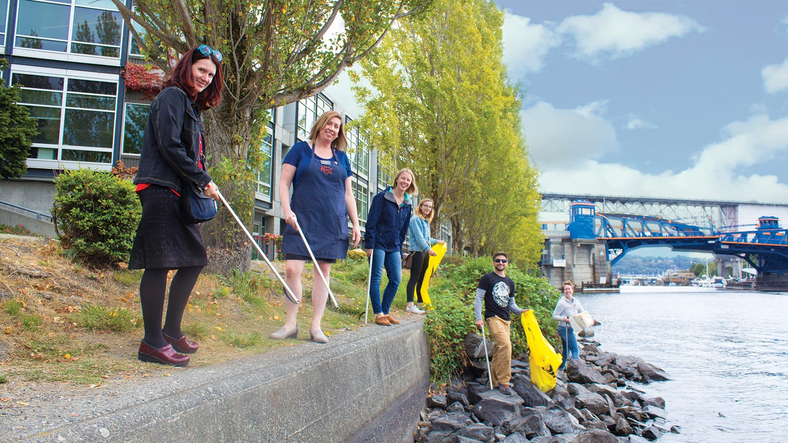 Fremont PCC and Puget Soundkeeper Alliance staff cleaning the Fremont canal.