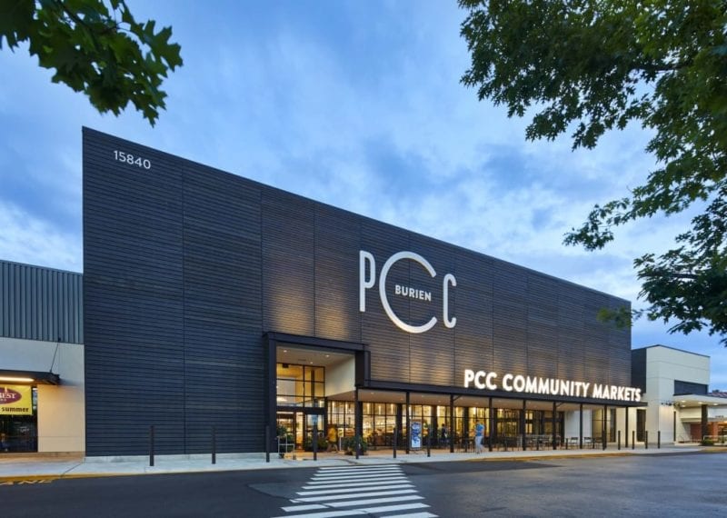 PCC Burien storefront at night.