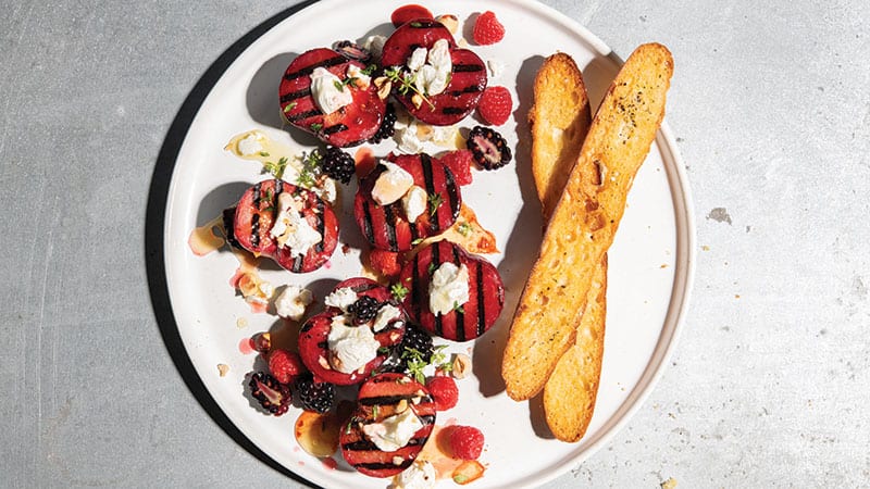 PCC grilled pluots Bianca cheese toasted hazelnuts.