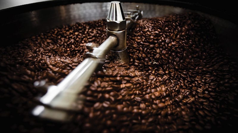 Fresh coffee beans being roasted