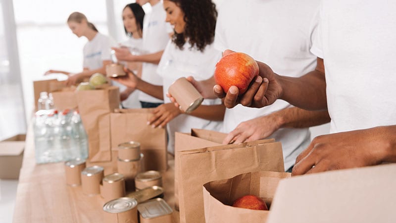 Food bank volunteers packing food